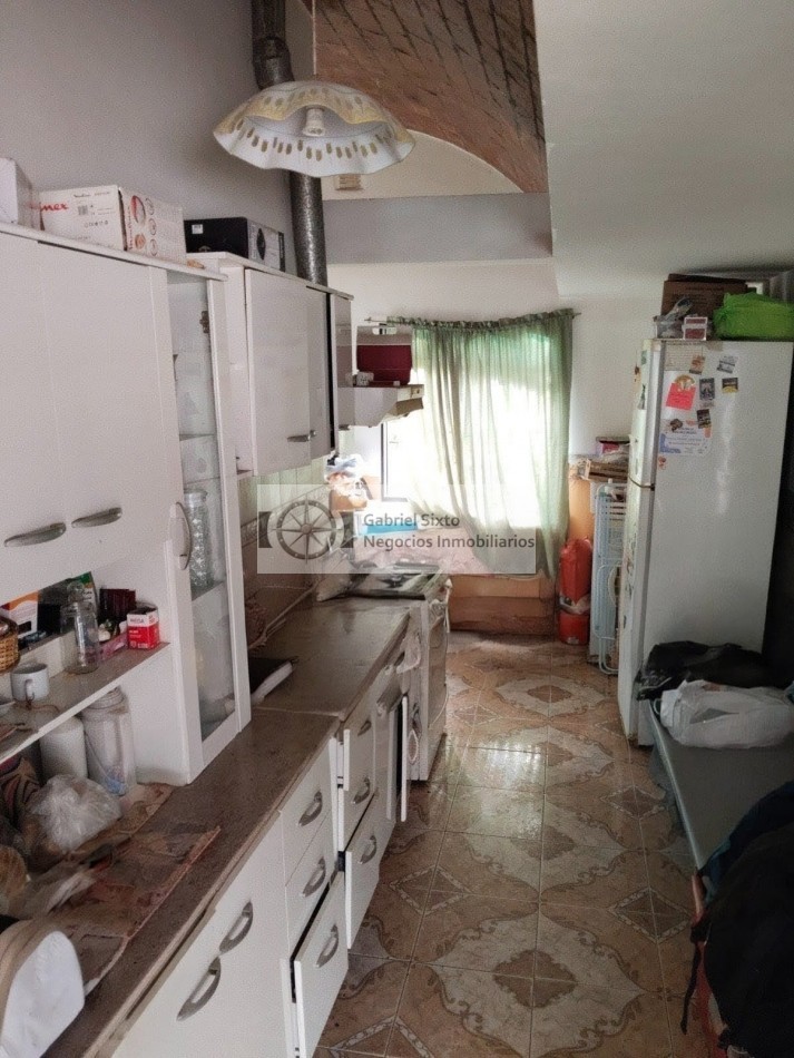 VENTA CASA B° 12 DE JUNIO NORTE LAS HERAS 2 DORM, COCHERA PASANTE 